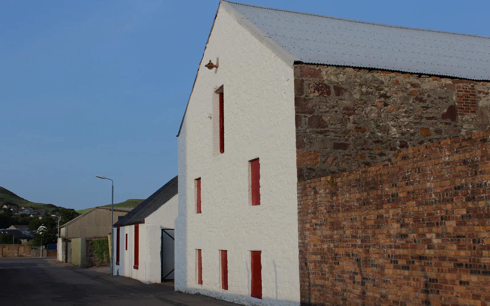 Landscape photograph of Glengyle distillery.