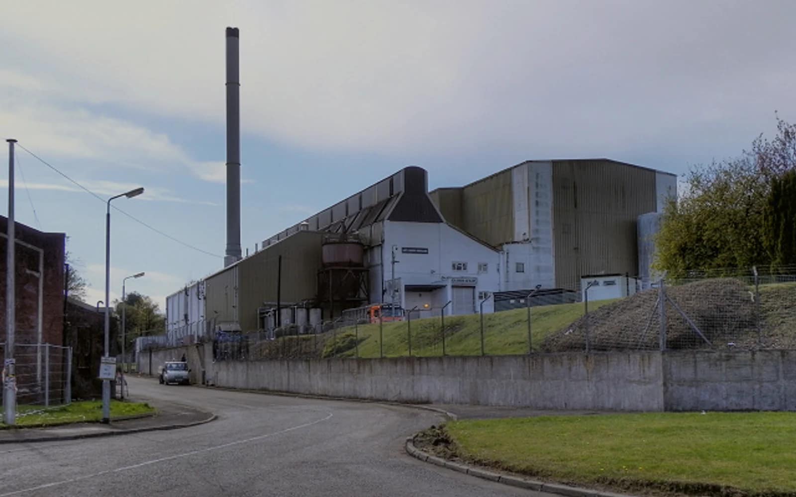 Landscape photograph of Loch Lomond Malt distillery.